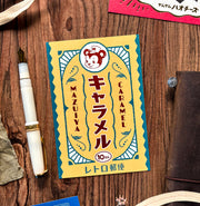 オビワン（Obi1）/ 箔押しポストカード「マズイヤキャラメル」