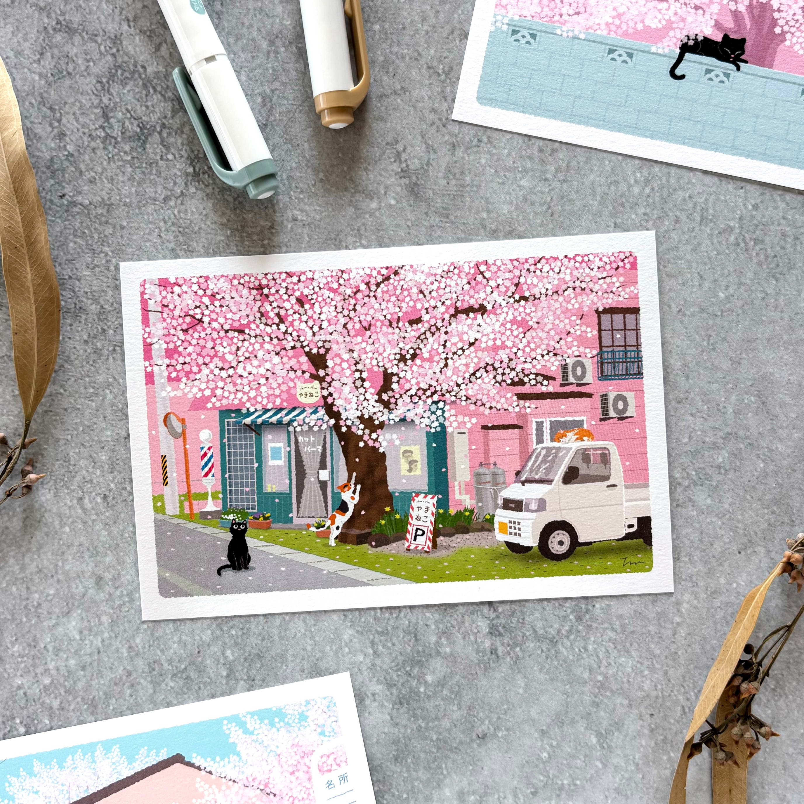 たびねこポストカード「春・桜通りの理髪店」