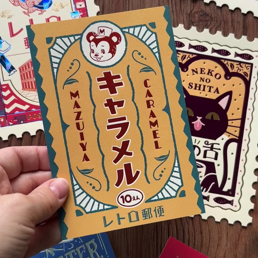 Load video: オビワン（Obi1）/ 箔押しポストカード「マズイヤキャラメル」